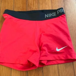 Bright red Nike compression shorts!
